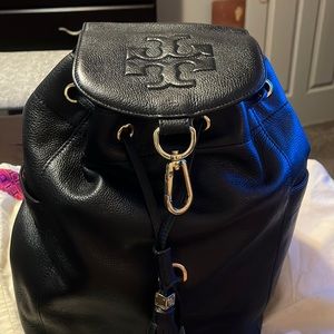 authentic good condition no scratches or marks two side pockets one inside also